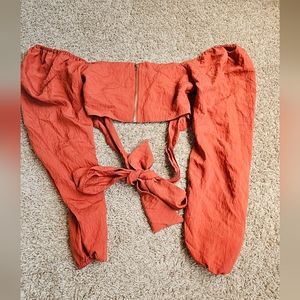 Girls(junior) orange off the shoulder top. Size(s).